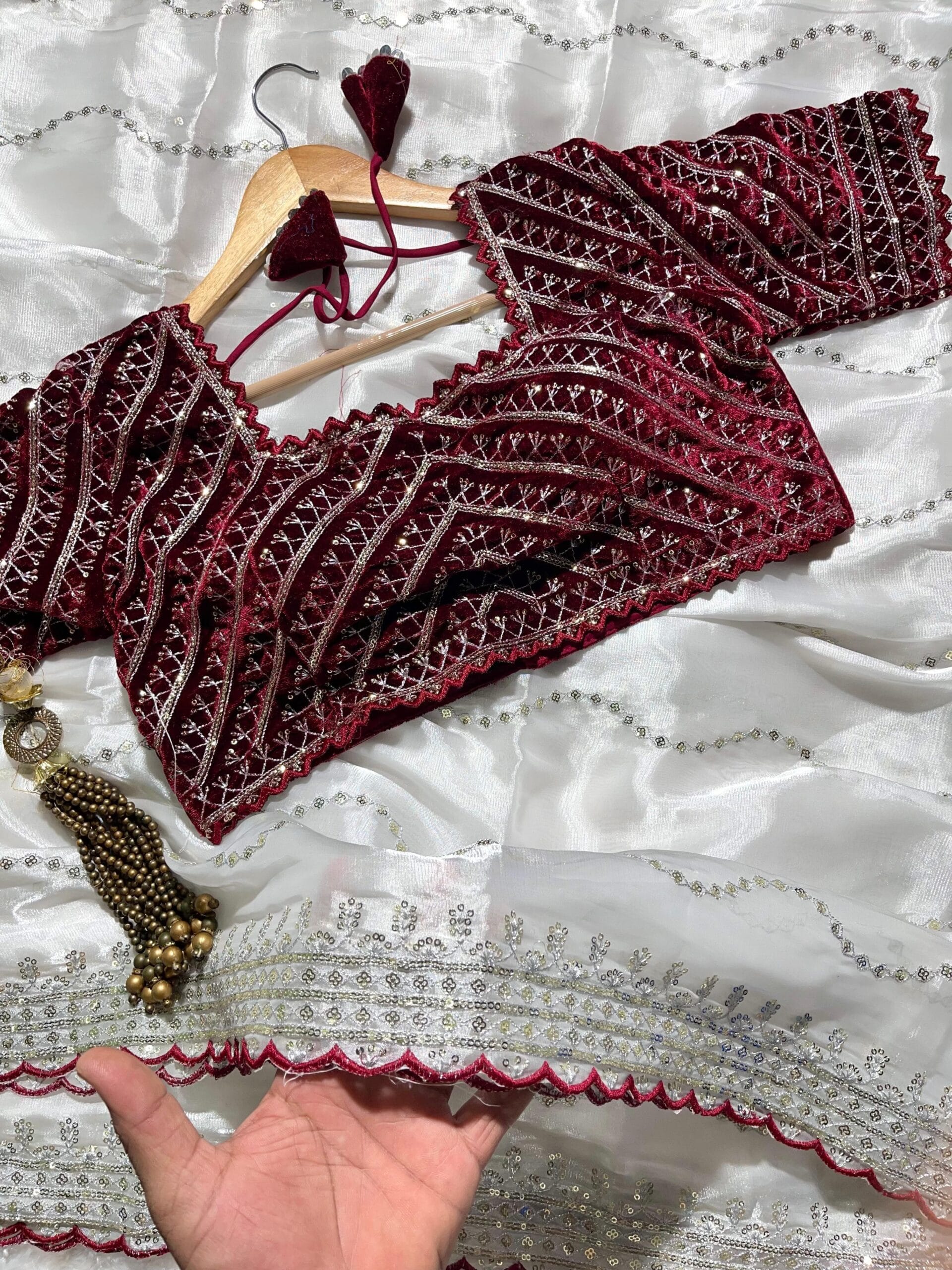 White Color Jimmy Choo Saree with Red Embroidery Blouse