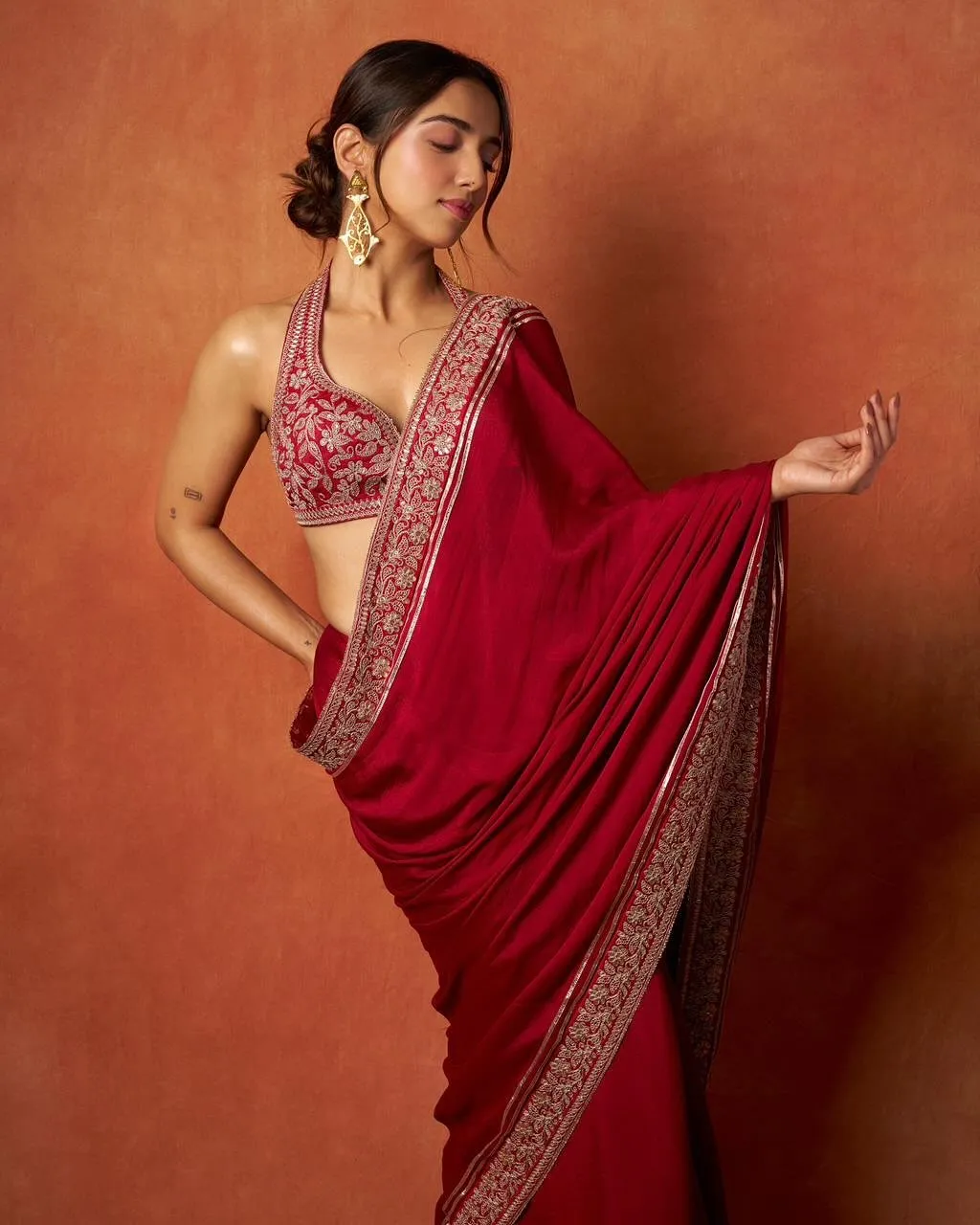 Ahsaas Channa wearing a red saree