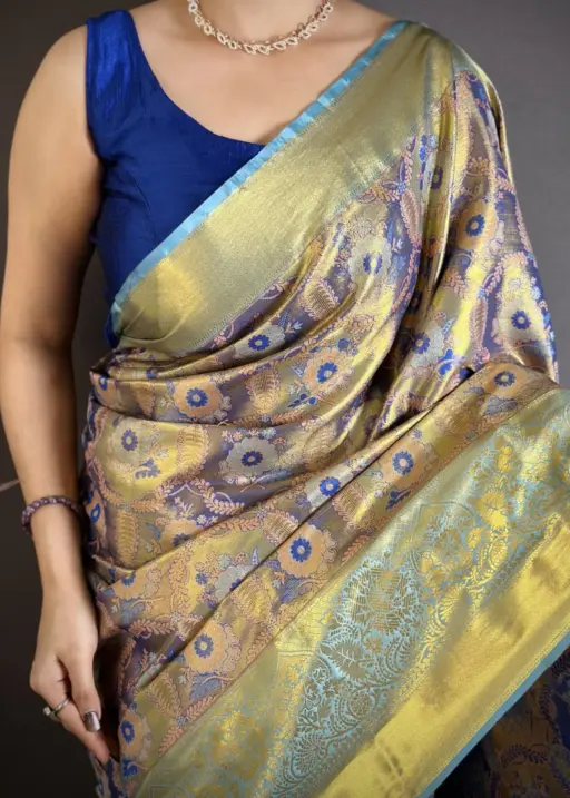 Blue Kanjivaram silk zari border saree for girls with woven pallu and traditional festive design