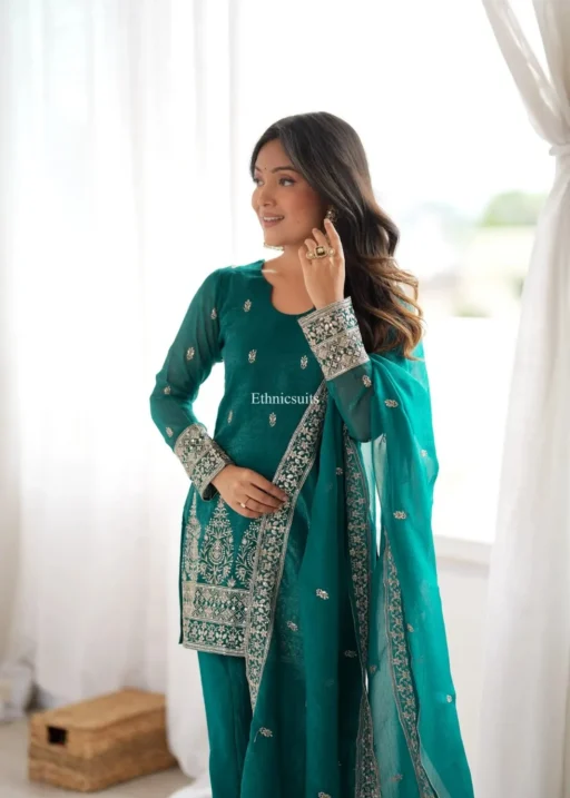 Lady Dressed up in Green Color Bell Bottom Salwar Suit for Festival